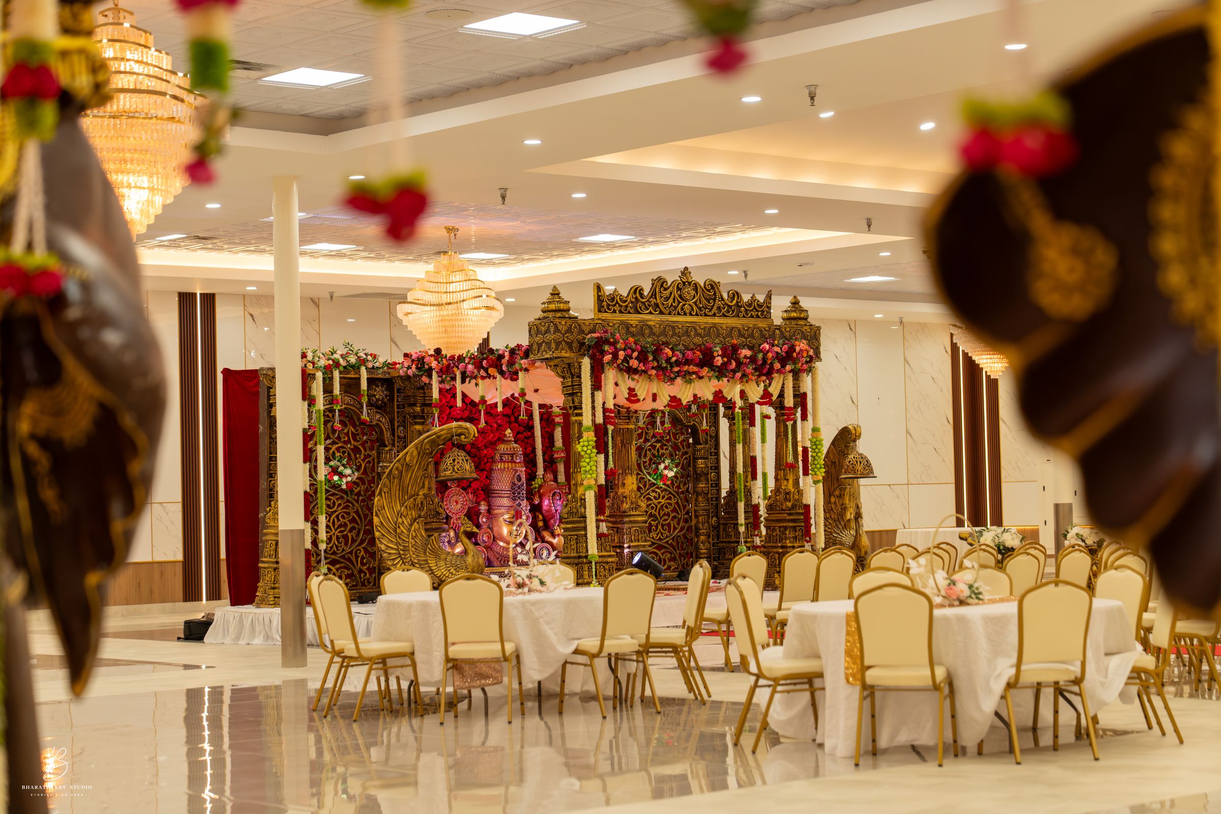 Grand ballroom with crystal chandelier — Triveni Banquet Hall South Riding